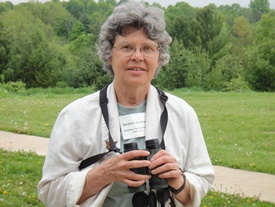 Barbara Duerksen Photo of Barb Duerksen holding binoculars