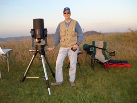John Heasley Photo of John Heasley next to telescope